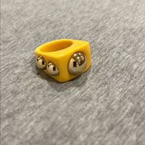 Yellow Ring plastic with Gold Accents Sz 6